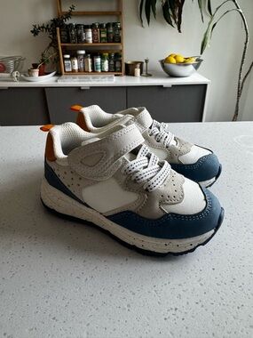Kids White and Navy Athletic Sneakers with Orange Accent